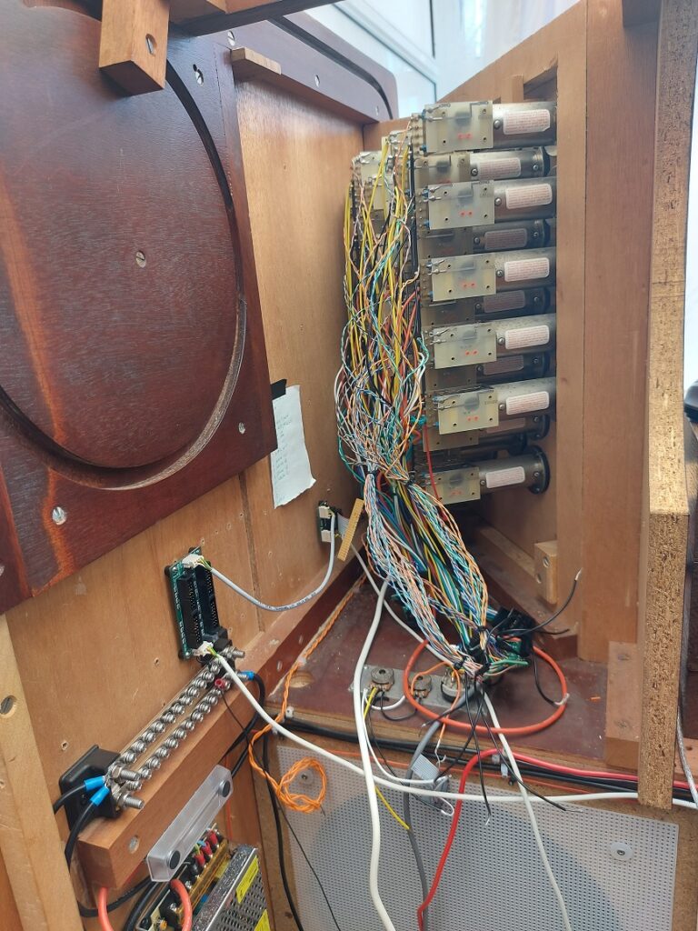 Photo of the back of the drawstops, showing the new twisted pair wiring.